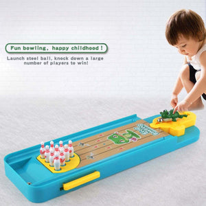 Children playing with educational bowling and basketball game toy for kids on a tabletop