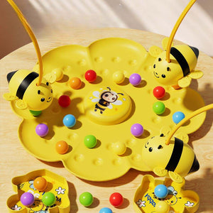 Children's bee honey collecting magnetic toy with colorful pieces and bees on a white background