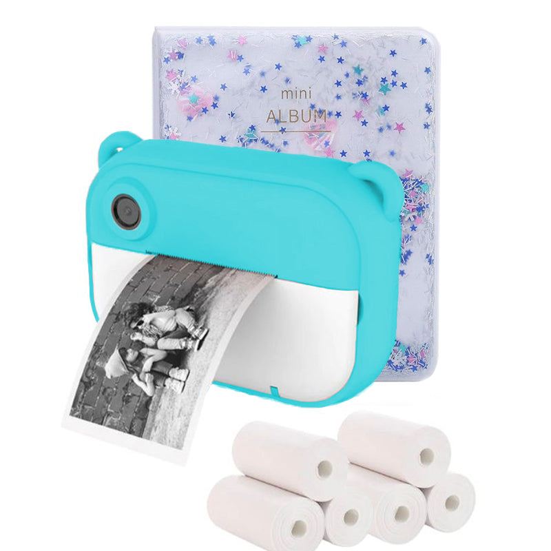 Blue Kid Instant Print Camera with black and white photo print, mini album with star design, and thermal paper rolls for kids photography fun