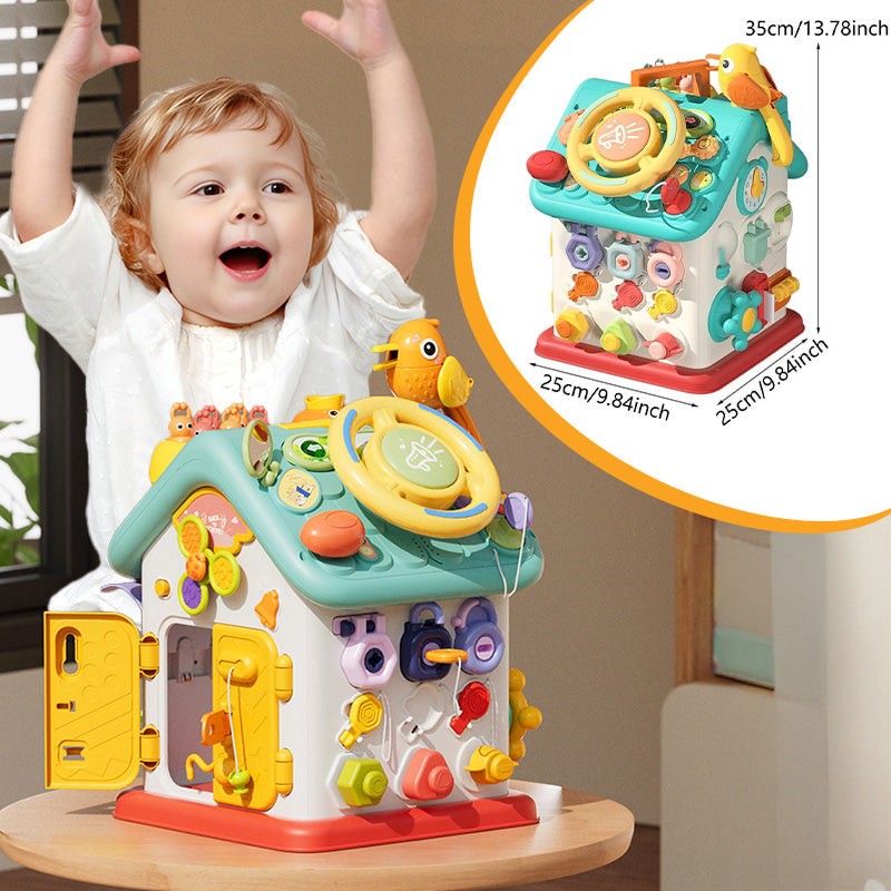 Montessori Busy House toddler toy with interactive doors, buttons, and lights for fine motor skill development.