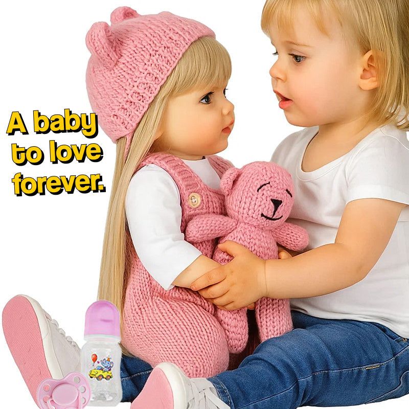 Real-feel baby doll with lifelike features held by toddler wearing white shirt and blue jeans